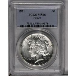 	1921 S$1 MS65 PCGS. Dazzling luster radiates from brig 1921