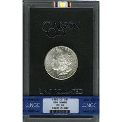 	1885-CC S$1 MS63 NGC. A semi-prooflike dollar with daz 1885-CC