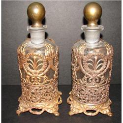 PAIR OF GLASS DECANTERS WITH ORMALU BRO