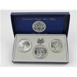 1983 OLYMPICS THREE-COIN  SILVER DOLLARS