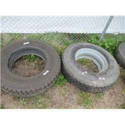 2 items - 1) Michelin New Cond 275/80 R 22.5 tire 1) Bridgestone 11 R 22.5 Tire & Rim