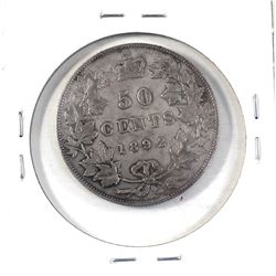 50-cent 1892 Obv.4 in F-VF condition. Coin has a light soft grey tone throughout with some medium to