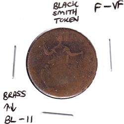 Token BL-11 Brass Black Smith Token in F-VF Condition.