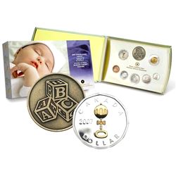 RCM Issue: 2007 Sterling Silver Baby Proof Set with Baby Rattle Loon Dollar. Coins contain light ton