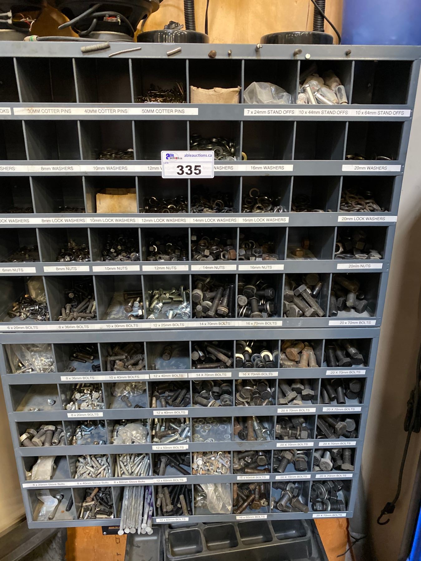 WALL MOUNT PARTS RACK WITH CONTENTS - Able Auctions