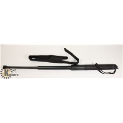 RETRACTABLE BATON IN BELT SHEATH
