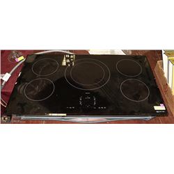JENN-AIR 36" INDUCTION COOKTOP-CORNER DAMAGE