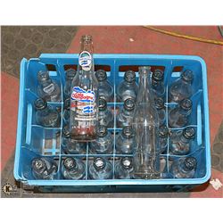 CASE OF 24 VINTAGE POP BOTTLES SOME EL SALVADORE