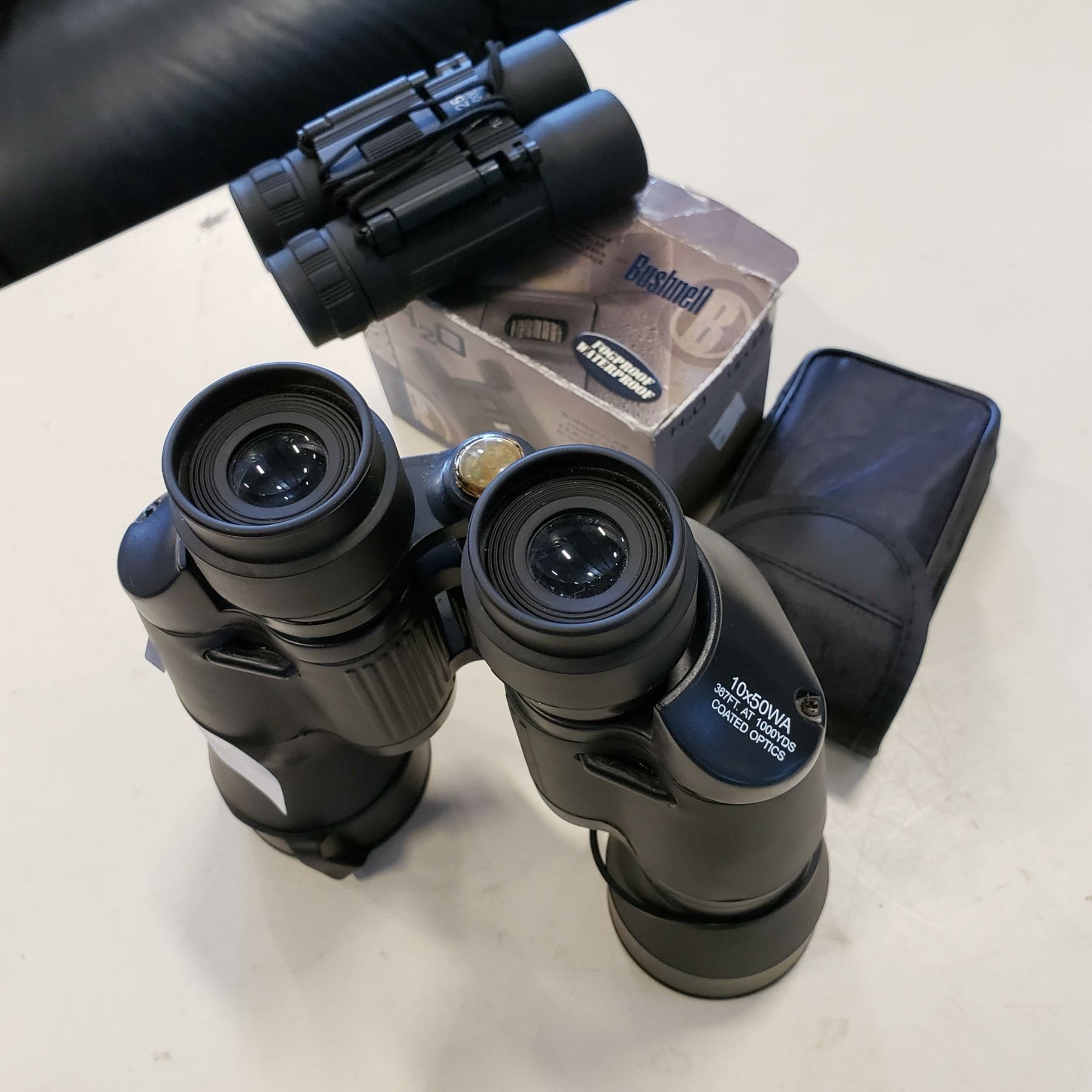 10 X 30WA BINOCULARS AND BUSHNELL 12 X 25 BINOCULARS Big Valley Auction 10 x 30wa binoculars and bushnell 12 x 25 binoculars big valley auction
