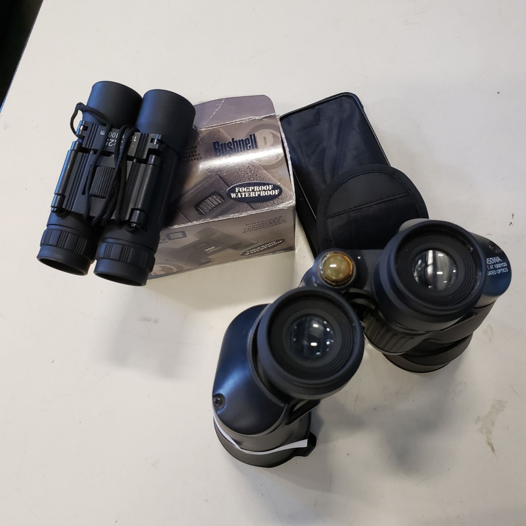 10 X 30WA BINOCULARS AND BUSHNELL 12 X 25 BINOCULARS Big Valley Auction 10 x 30wa binoculars and bushnell 12 x 25 binoculars big valley auction