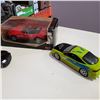 Image 2 : PAUL MCARTEY BMW Z8 ROASTER, JADA DODGE MAGNUM AND MITSUBISHI RACING CHAMPIONS DIE CAST CARS
