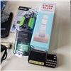Image 2 : BATTERY CHARGER, GARMIN GPS, MICRO SD PLAYER, FLASHLIGHT, STORM GLASS AND MORE