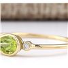 Image 2 : 0.58 CTW Natural Peridot And Diamond Ring In 18K Yellow Gold