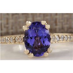 1.96 CTW Natural Tanzanite And Diamond Ring 18K Solid Yellow Gold