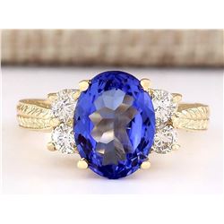 4.10 CTW Natural Tanzanite And Diamond Ring In 18K Yellow Gold