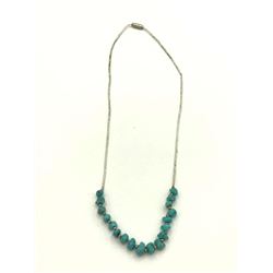 LIQUID SILVER TUBED NECKLACE W TURQ CHUNK