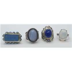 4-STERLING RINGS w/BLUE STONES