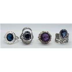 4-STERLING RINGS WITH DEEP BLUE CENTER STONE