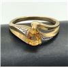 Image 1 : 10K DIAMOND RING W ORANGE STONE SIZE 7