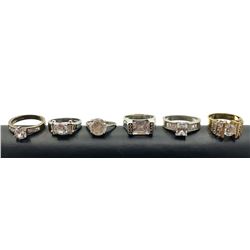 6 STERLING RINGS WITH CLEAR STONES!!!!