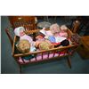 Image 1 : Child's vintage cradle filled with dolls including vintage Dee and Cee, Regal, handmade doll etc. no
