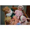 Image 2 : Child's vintage cradle filled with dolls including vintage Dee and Cee, Regal, handmade doll etc. no