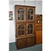 Image 1 : Tudor style oak display cabinet with four glazed and two solid doors, 79" in height