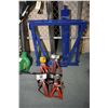 Image 1 : Selection of garage tools including a Sears 3000 lbs. floor jack, four jack stands and a tire storag