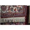 Image 2 : Turkish made wool carpet with center medallion, red background, highlights in blues, cream, taupe et