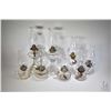 Image 1 : Eight colourless pressed glass oil lamps including finger lamps etc.