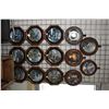 Image 1 : Fourteen framed collector plates including cottage scenes and wolves