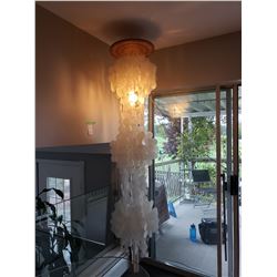 Hanging pooka shell lamp