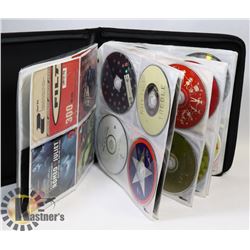 BINDER OF ASSORTED CDS