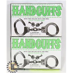 TWO HANDCUFFS WITH KYES