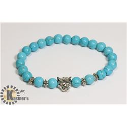 #145-TOURQUOISE BRACELET 8MM/ 7.5"