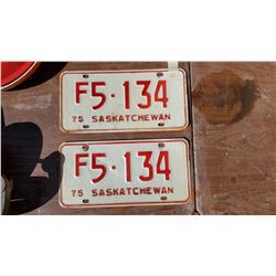 TWO 1975 LICENSE PLATES