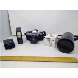 35MM CANON CAMERA AND EXTRA LENS