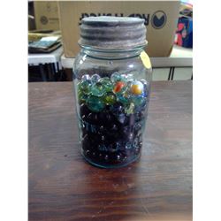 VINTAGE JAR WITH MARBLES