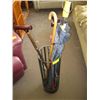 Image 1 : CANE OR UMBRELLA HOLDER WITH 1 UMBRELLA AND ASSORTMENT OF CANES