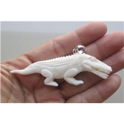 Hand Carved Dinosaurus Pendant