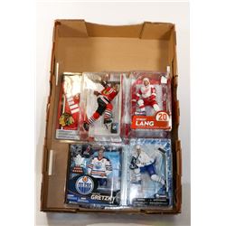 GROUP OF 4 NHL COLLECTIBLE FIGURES,  INCLUDES