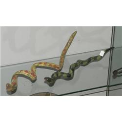 1 PAIR OF CARVED AND PAINTED SNAKES