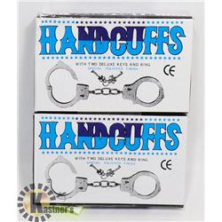 TWO NEW CANDCUFFS WITH KEYS