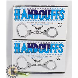 TWO NEW CANDCUFFS WITH KEYS