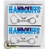 Image 1 : TWO NEW HANDCUFFS WITH KEYS