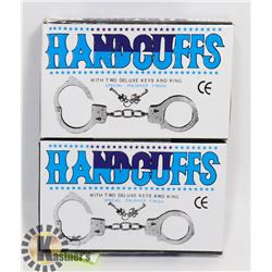 TWO NEW CANDCUFFS WITH KEYS