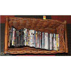 LOT OF APPROX 30 DVDS IN BASKET.