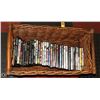 Image 1 : LOT OF APPROX 30 DVDS IN BASKET.