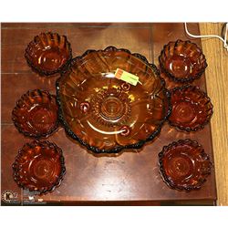 VINTAGE 7 PC AMBER GLASS BOWL SET.
