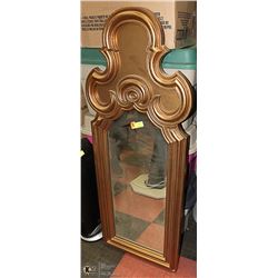 GOLD TONE FRAMED WALL HANGING MIRROR.